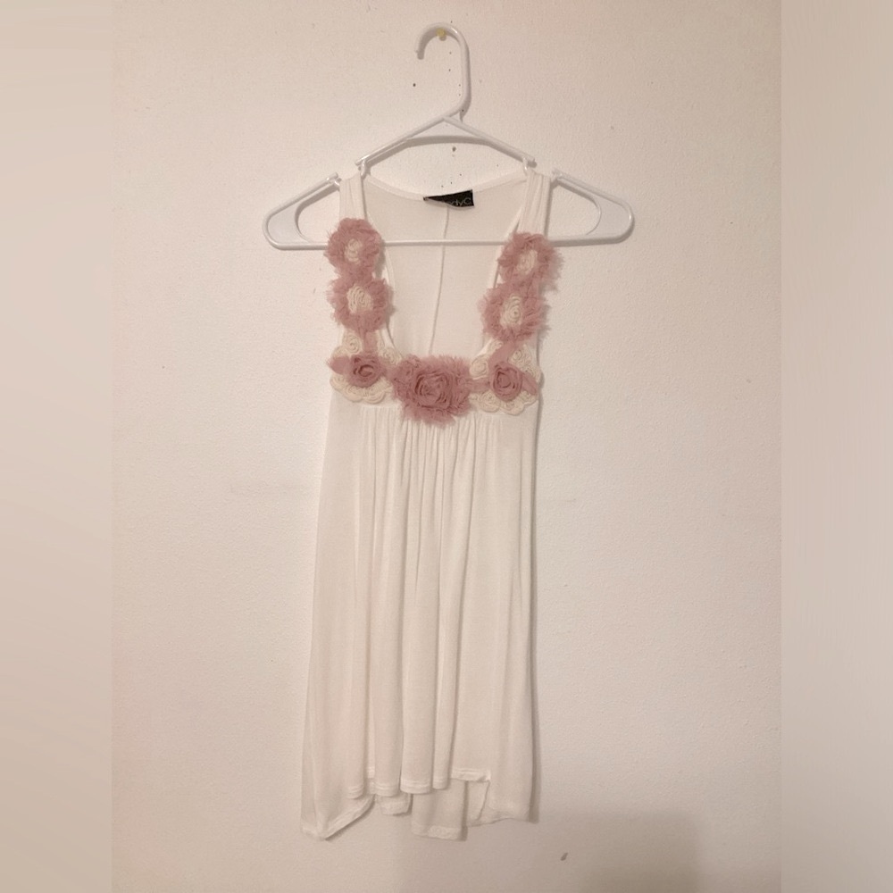 NWOT Flower ruffled white and pink blouse. P2P 16” length 30 1/2” medium